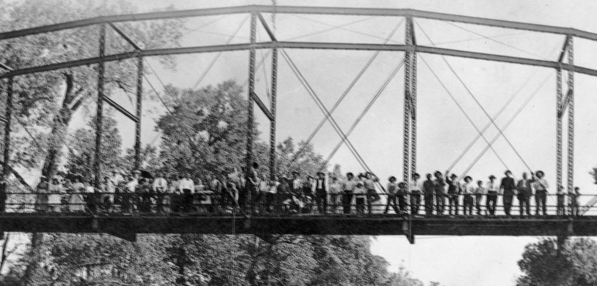 Crowd poses for image on bridge where Mrs. Nelson and her son are lynched.