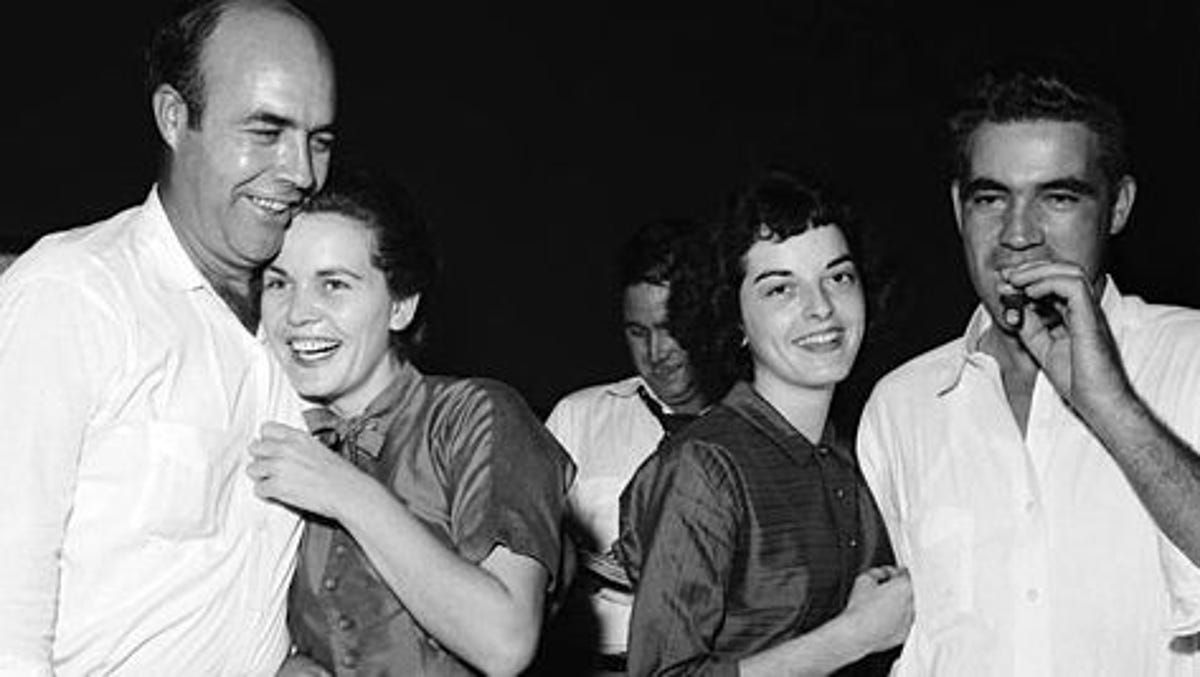 J.W. Milam and Roy Bryant celebrate the acquittal with their wives.