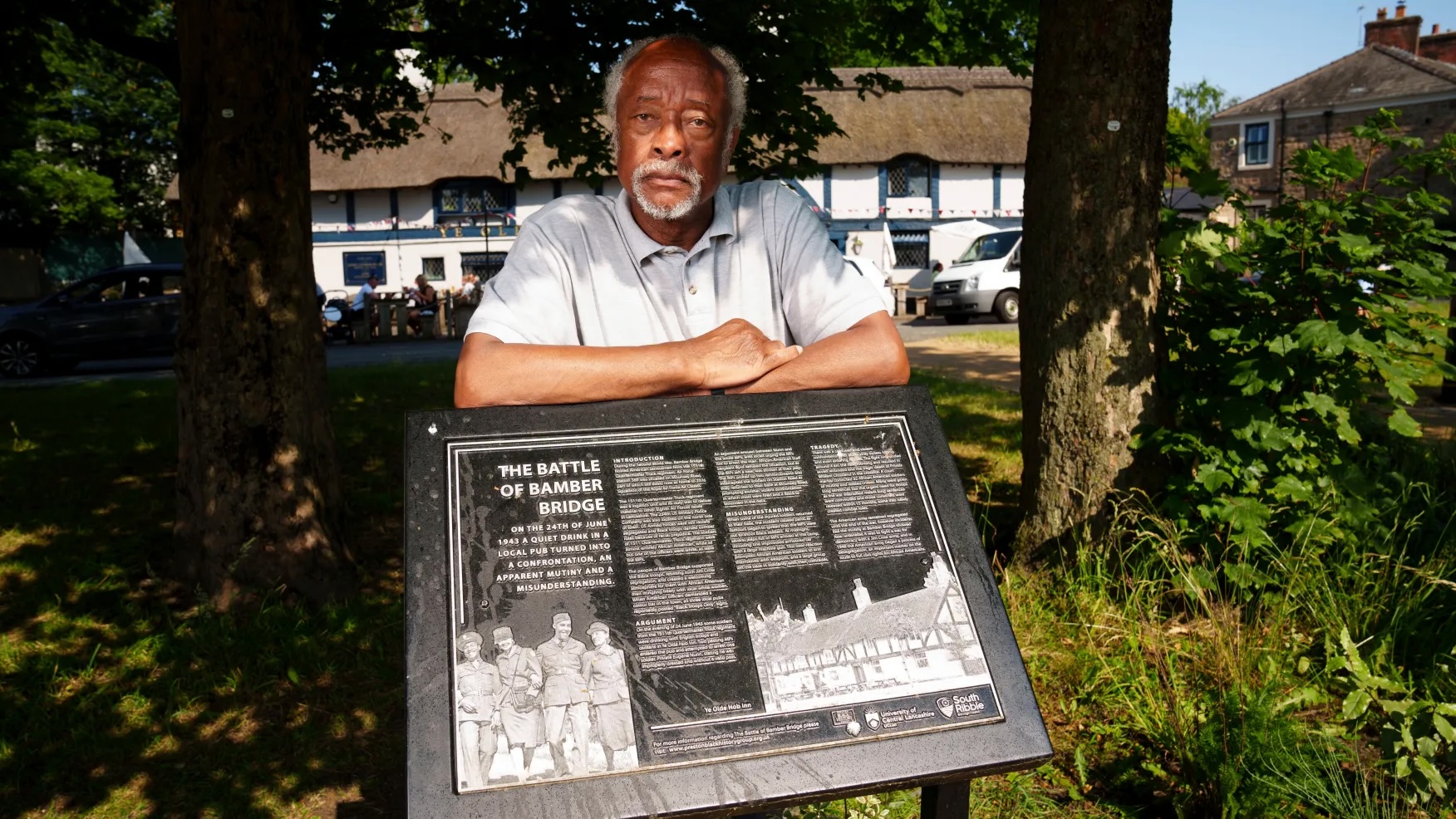 “Clinton Smith, chair of Preston Black History Group is seen by the Ye Olde Hob Inn in Bamber Bridge near Preston, England, Thursday, June 22, 2023.”