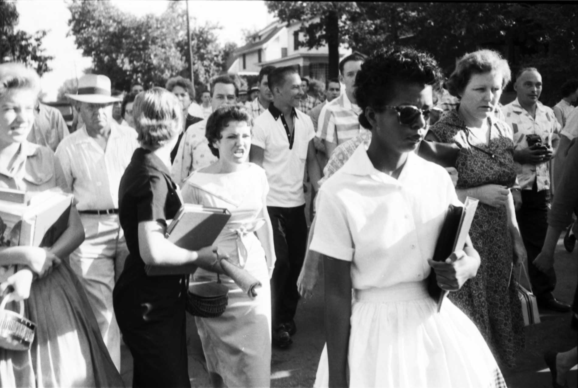 White protestors surround Elizabeth Eckford as she integrates Central High School in Little Rock, Arkansas, in 1957. 